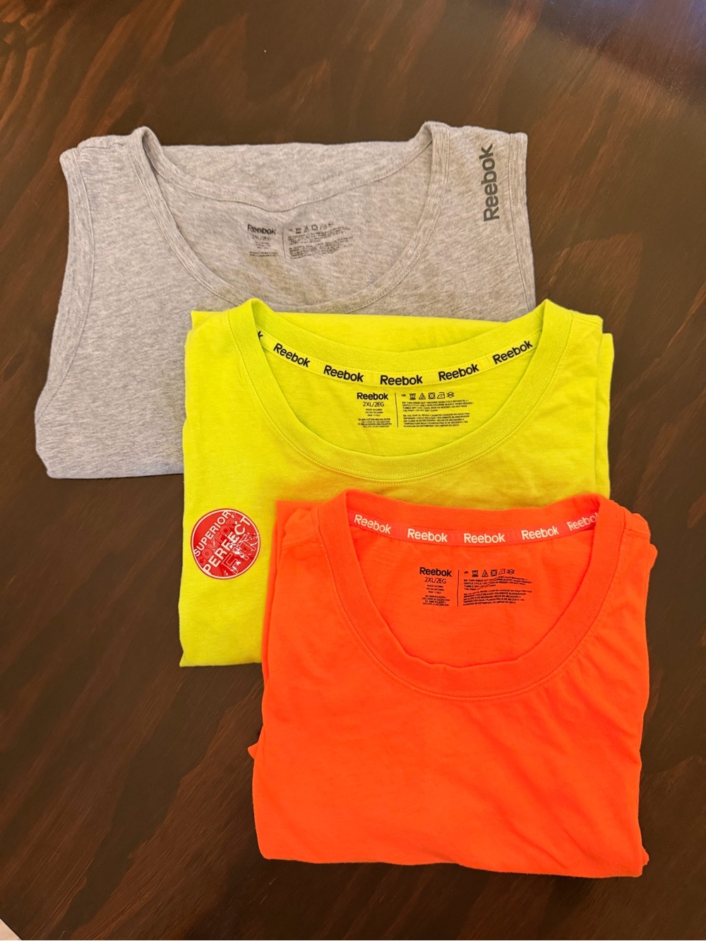 Reebok Men’s Tank Top Trio in Gray, Neon Yellow, Neon Orange